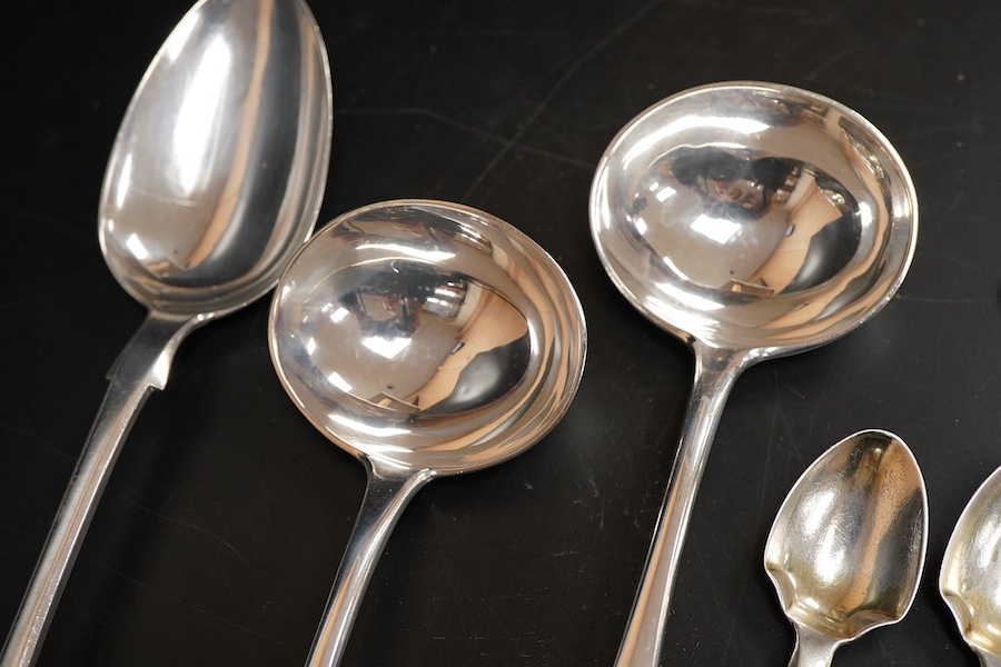 A pair of Edwardian silver Old English pattern sauce ladles, by Daniel & John Welby, London, 1901, 17.3cm, together with seven other items of silver flatware including a fiddle pattern table spoon, London, 1845 and a mot